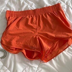 Coral mesh racer run 4” athleta shorts